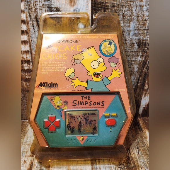 Bart Simpsons Cupcake Crisis Handheld Electronic Video Game by AKKLAIM 1989 NEW - Picture 1 of 6